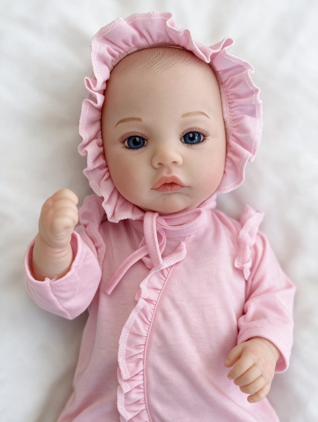Bebé real interactivo, modelo rosa en ambiente